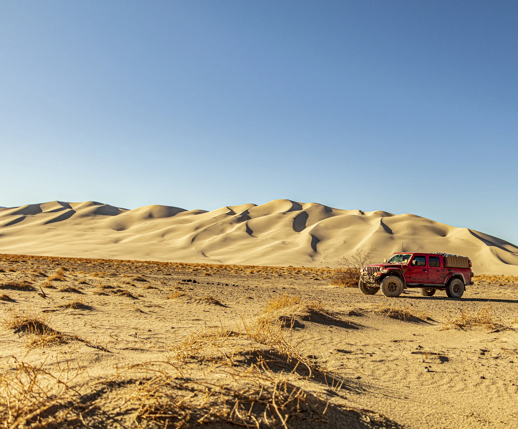 Wide desert off-road landscape frame, directed lifestyle photography, color-graded